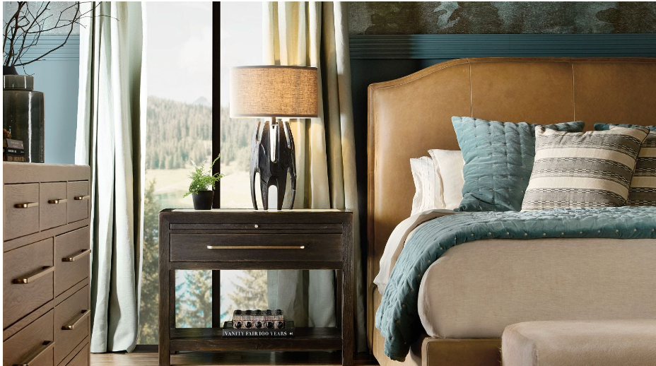  bedroom with a bed, nightstand, and dresser.